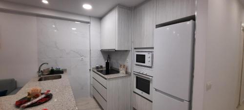 Kuchyňa alebo kuchynka v ubytovaní Apartamento Costa de Almería a 50m Playa San Miguel