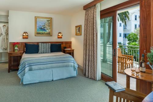 Ένα ή περισσότερα κρεβάτια σε δωμάτιο στο The Avalon Hotel in Catalina Island
