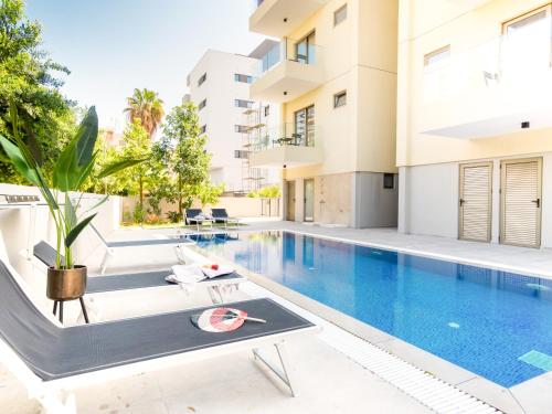 an image of a swimming pool in a house at Sanders Evolution in Limassol