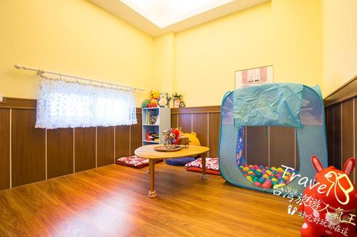 Flowers Blooming Homestayにあるベッド