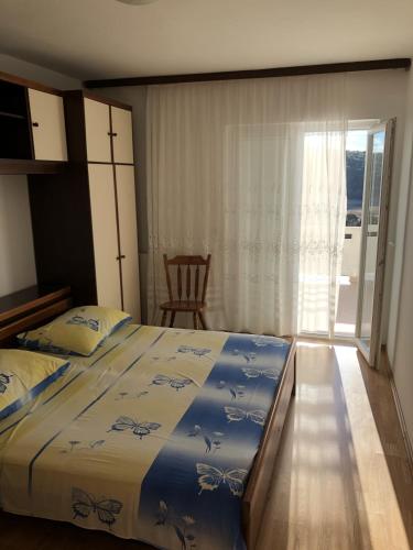 Apartments with parking space Kampor, Rab - 17034