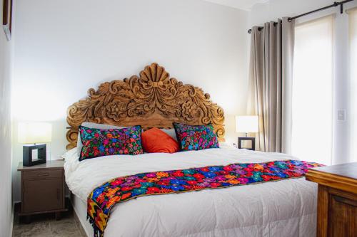 Ένα ή περισσότερα κρεβάτια σε δωμάτιο στο BELLAS VILLAS, VILLA AMOR HERMOSA CASA a UN ACCECIBLE PRECIO