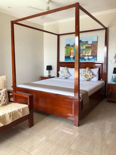 Postel nebo postele na pokoji v ubytování Ocean Breeze Resort