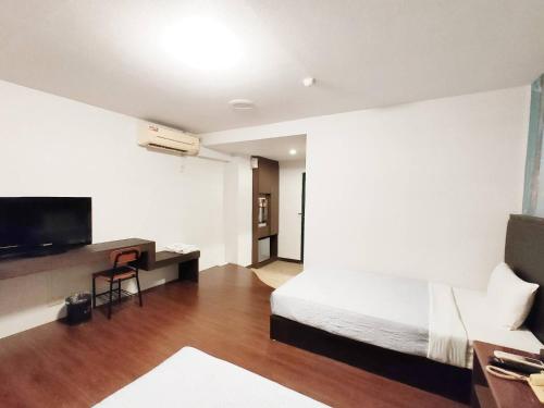 Μια τηλεόραση ή/και κέντρο ψυχαγωγίας στο Royal Business Hotel