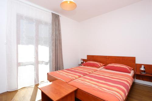 Apartments by the sea Arbanija, Ciovo - 17332