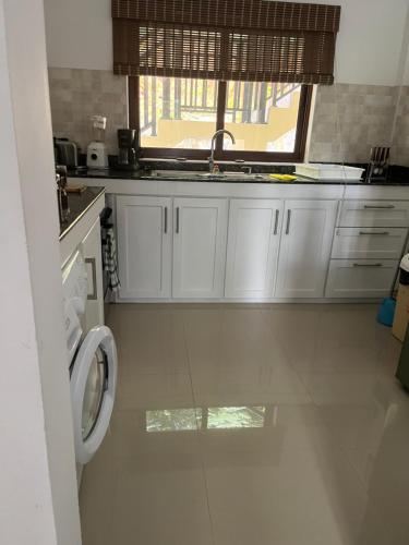 Dapur atau dapur kecil di Kanasuk Self catering Apartments