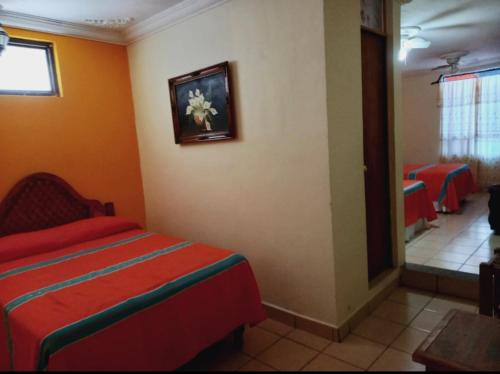 Un ou plusieurs lits dans un hébergement de l'établissement Hotel Posada de la Conspiración