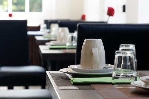 Un restaurante o sitio para comer en Hotel Jellentrup - Adults Only