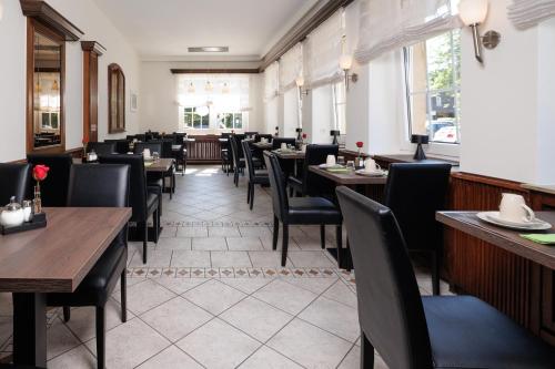 Un restaurante o sitio para comer en Hotel Jellentrup - Adults Only