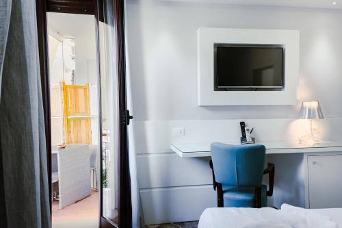 Televisyen dan/atau pusat hiburan di B&B Vanity