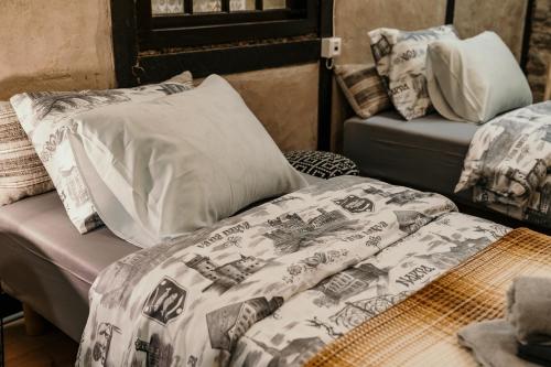 Una cama o camas en una habitación de Narva Castle Rooms