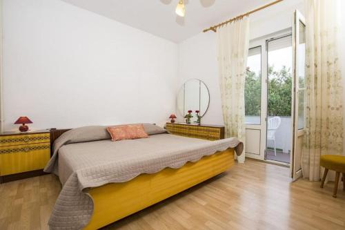 Ένα ή περισσότερα κρεβάτια σε δωμάτιο στο Rooms with WiFi Kampor, Rab - 17412