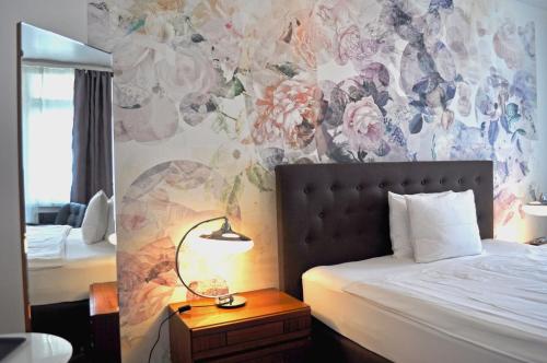 Postel nebo postele na pokoji v ubytování Guesthouse fürDich