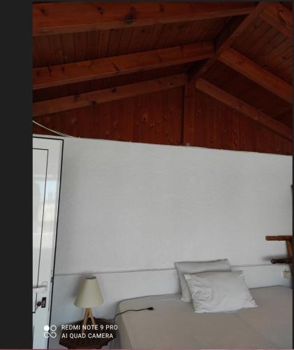 Una cama o camas en una habitación de Paradise Studios