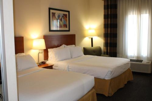 a hotel room with two beds and a window at Holiday Inn Express Hotel Vernal by IHG in Vernal