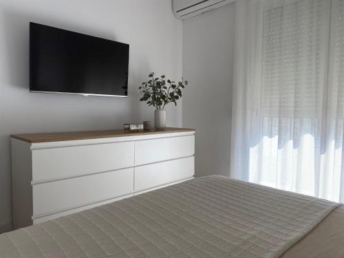 Μια τηλεόραση ή/και κέντρο ψυχαγωγίας στο AGRADABLE CASA EN SAN JOSE