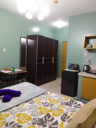 Vuode tai vuoteita majoituspaikassa Budget Friendly Condo for Rent along Ortigas Ext