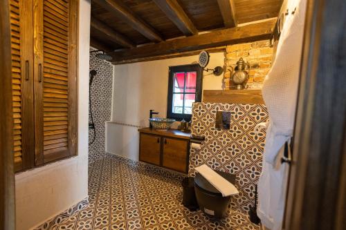 a bathroom with a sink and a toilet in a room at NOMAD STUDIOS, Kapana in Plovdiv