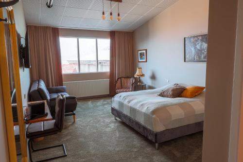 Postel nebo postele na pokoji v ubytování Hotel Kaldi
