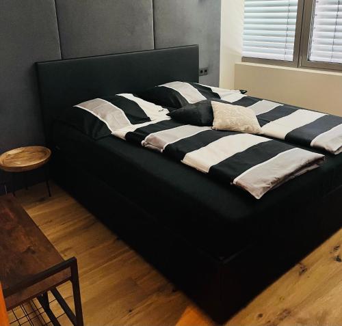 Cama ou camas em um quarto em Kitz-Apartment