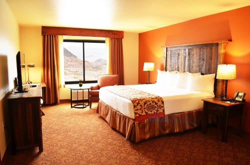 a hotel room with a bed and a window at Hoover Dam Lodge in Boulder City