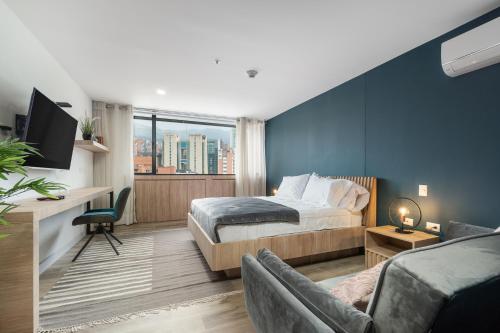 TV/Unterhaltungsangebot in der Unterkunft Apartamentos Go Living & Suites by HOUSY HOST