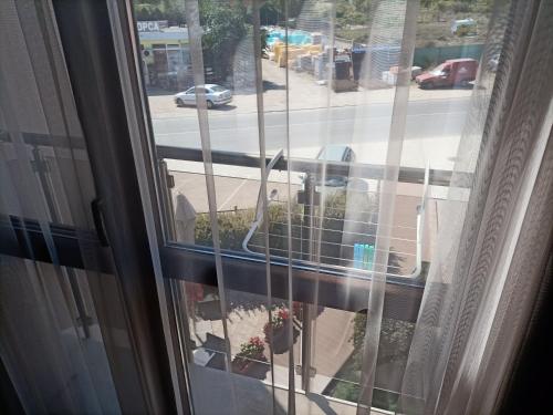 a view of a city street from a window at Hotel Vanilla, Varna - Free parking in Varna City