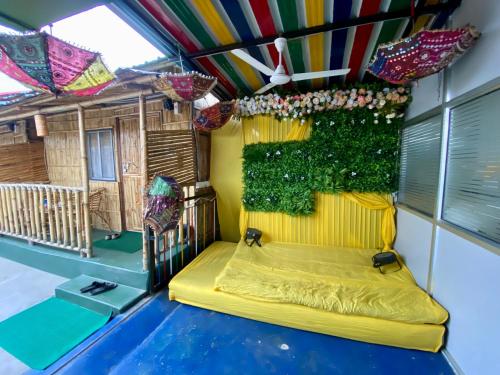 a view of a house with a pool in a room at Tridhara HomeStay in Guwahati