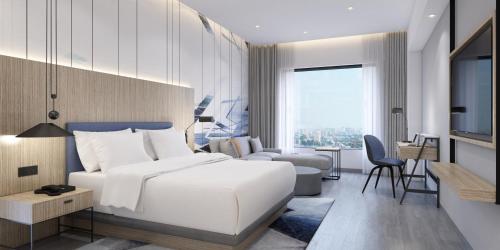 Hyatt Place Bharuchにあるベッド
