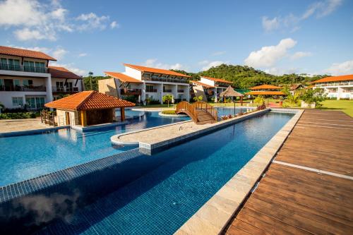 Casa com 3 suítes e vista para a piscina no Club Meridional Praia dos Carneiros