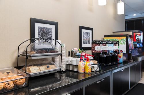 a counter with food and drinks on it at Staybridge Suites Las Vegas - Stadium District in Las Vegas