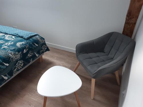 Ein Bett oder Betten in einem Zimmer der Unterkunft Gîte Les Piraudières