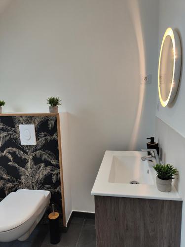 Ein Badezimmer in der Unterkunft Gîte Les Piraudières