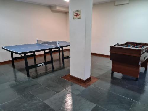 Kemudahan pingpong di MODERN Apartamentos Enseada Guarujá atau berdekatan