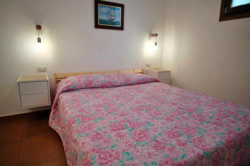Ένα ή περισσότερα κρεβάτια σε δωμάτιο στο Casa del Mare - Oasi verde a soli 100m dal mare!