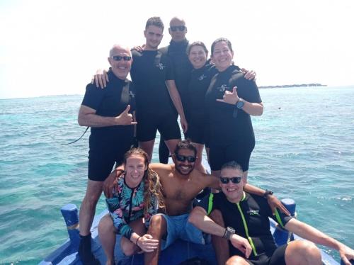 a group of people on a boat in the water at Aasna Inn in Thulusdhoo