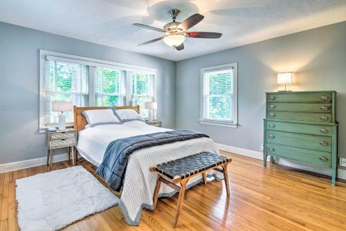 a bedroom with a bed and a ceiling fan at Idyllic Springfield Haven with Screened Porch! in Springfield