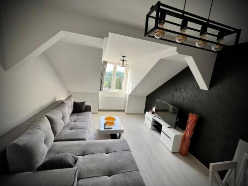 Posezení v ubytování Lux Apartman Rudnik