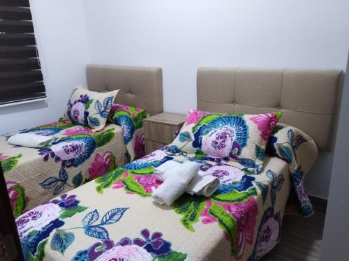 Llit o llits en una habitació de Apartamentos turísticos Cambil