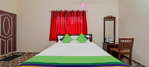 SRI SAVERAA RESIDENCYにあるベッド