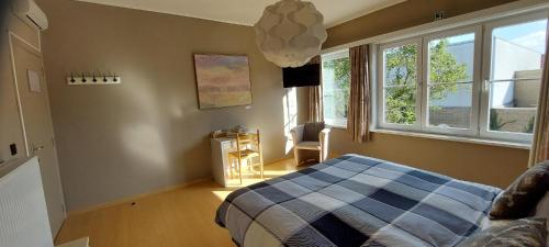 Postel nebo postele na pokoji v ubytování Room "Carpe Diem"
