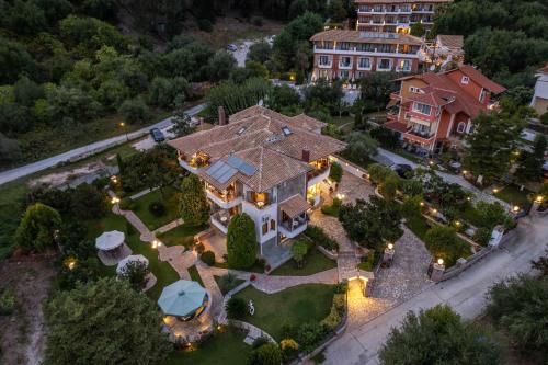 an aerial view of a house with a mansion at Villa Haroula in Parga