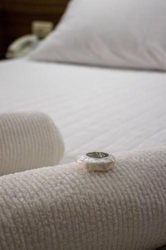 Un ou plusieurs lits dans un hébergement de l'établissement Das Heim Hotel