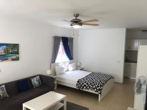 Postel nebo postele na pokoji v ubytování Studio Residencial Almendra