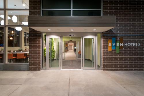 a building with the entrance to a hotel at EVEN Hotel Omaha Downtown - Old Market by IHG in Omaha