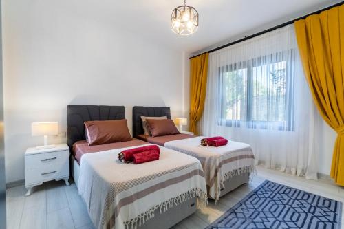 Postel nebo postele na pokoji v ubytování Contemporary Luxury Villa in Yalıkavak Center