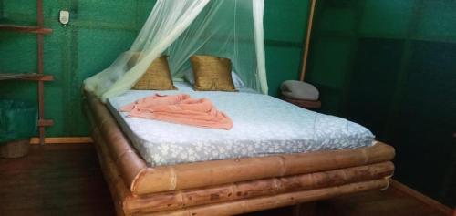 Cama ou camas em um quarto em Mohagine Hotel