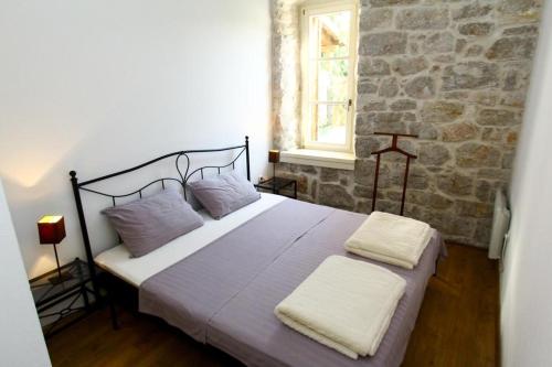 Ένα ή περισσότερα κρεβάτια σε δωμάτιο στο Apartments by the sea Sveti Filip i Jakov, Biograd - 17695