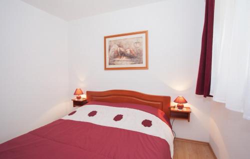 Ένα ή περισσότερα κρεβάτια σε δωμάτιο στο Apartment Punat 17857c
