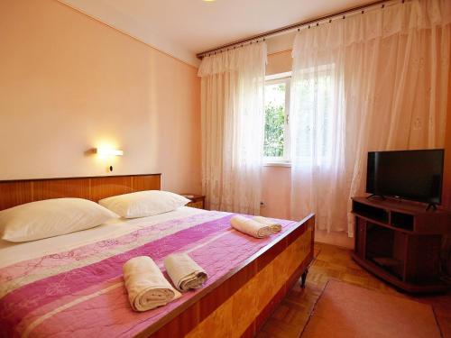Apartments with parking space Palit, Rab - 17881